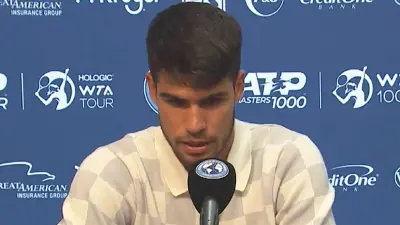 Carlos Alcaraz at the podium
