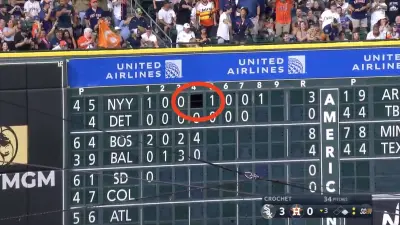 Astros star Jose Altuve's hit taking out a panel from the out-of-town scoreboard. The panel was from a Yankees game.