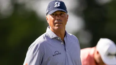 Matt Kuchar looking on