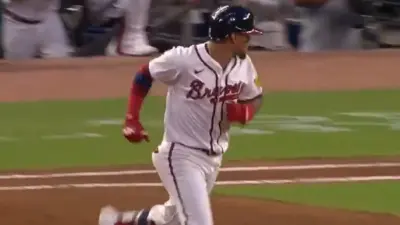 Orlando Arcia looks over