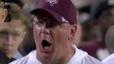 Mike Elko yells at an assistant coach