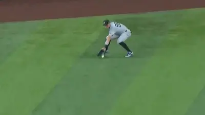 Aaron Judge fielding a ball in the outfield