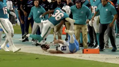 Titans QB Will Levis diving out of bounds