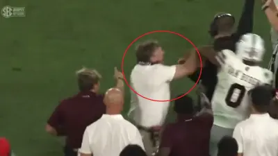 Kirby Smart shoves a player