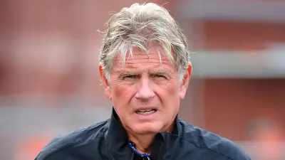 Mike Westhoff looks on