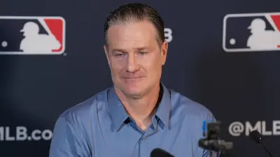 David Bell speaking to reporters