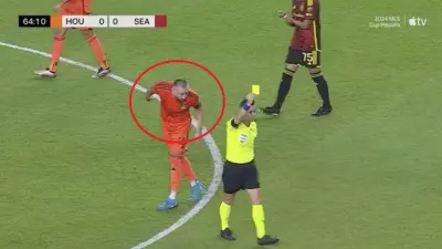 Hector Herrera spitting at a referee