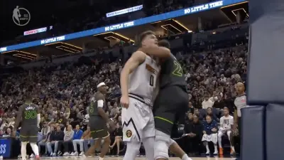 Rudy Gobert swinging at Christian Braun