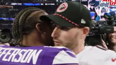 Kirk Cousins and Justin Jefferson embrace