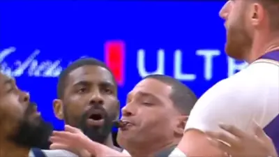 Kyrie Irving reacts to Mavs-Suns fight