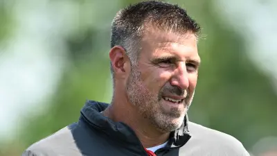 Mike Vrabel looks on