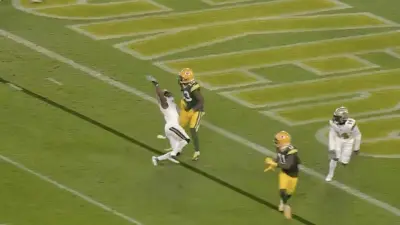 Ugo Amadi flops against Dontayvion Wicks