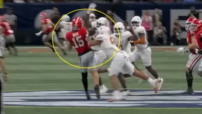 Carson Beck gets hit