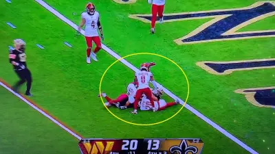 Commanders and Saints players