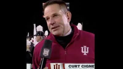 Indiana coach Curt Cignetti giving an interview during halftime against Notre Dame