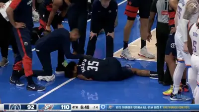 Wizards big man Marvin Bagley III on the ground with a knee injury
