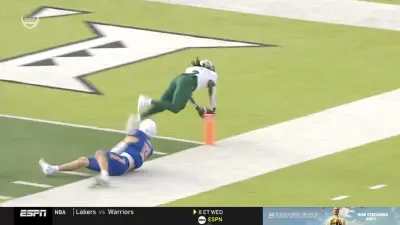 USF's Ta'ron Keith scores a 93-yard kick return touchdown in the Hawaii Bowl