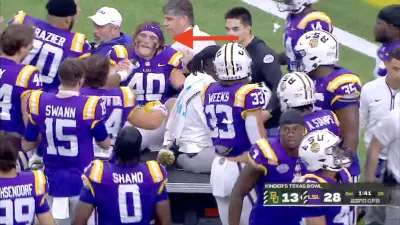 LSU captain Whit Weeks being carted off the field with an ankle injury