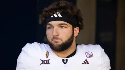 Cam Skattebo looks on