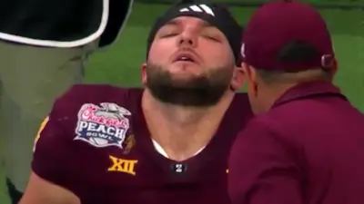Cam Skattebo looking sick on the sideline