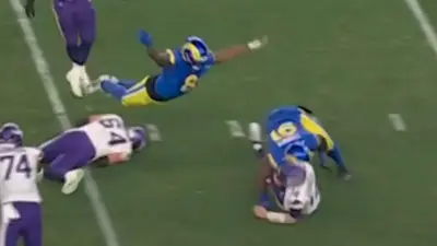 Jared Verse dives for the quarterback