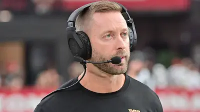 Kliff Kingsbury looks on
