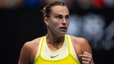 Aryna Sabalenka in a yellow outfit