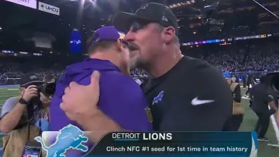 Dan Campbell hugs Kevin O'Connell
