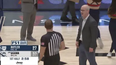 UConn head coach Dan Hurley arguing with a referee