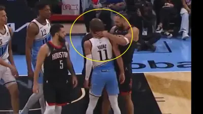 Dillon Brooks grabs Trae Young at the neck