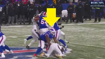 Dion Dawkins pushes down a player