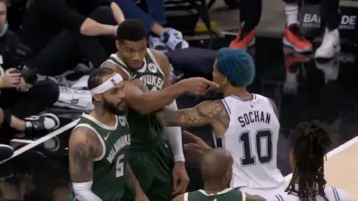 Giannis Antetokounmpo pointing at Chris Paul