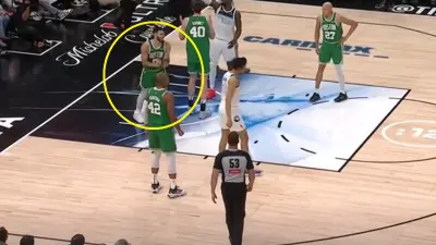 Jayson Tatum clapping his hands in frustration