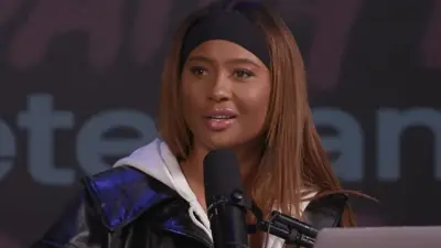 Kayla Nicole in front of a microphone