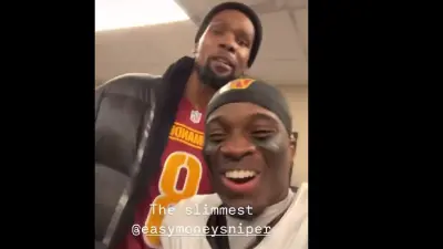 Kevin Durant with Mike Sainristil