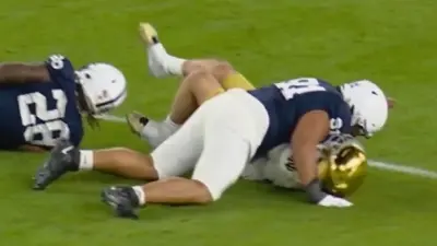Riley Leonard knocked down