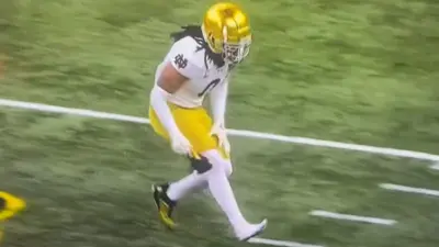 Xavier Watts fakes an injury