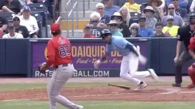 Chandler Simpson sprints to first base