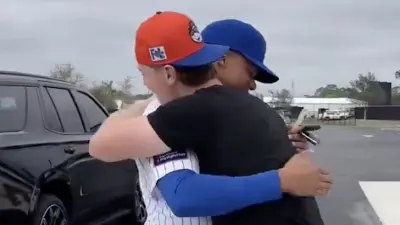 Juan Soto gives Brett Baty a hug