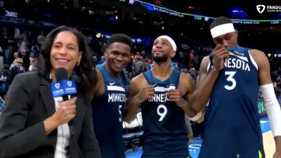 Anthony Edwards smiling during a postgame interview