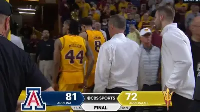 Bobby Hurley walks off the court