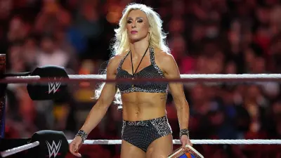 Charlotte Flair standing in the ring