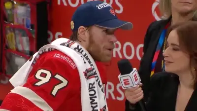 Connor McDavid talks into the mic