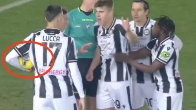 Udinese striker Lorenzo Lucca arguing with his teammates