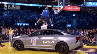 Mac McClung jumping over a car during the NBA Slam Dunk Contest