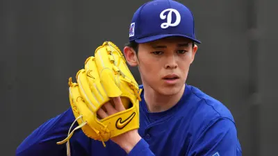 Roki Sasaki holds up his glove