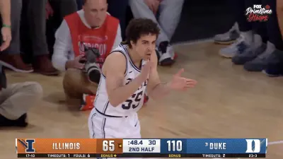 Duke senior Spencer Hubbard clapping