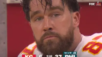 Travis Kelce with a stunned look on his face