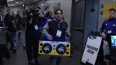 Amir Khan leads McNeese out of the locker room