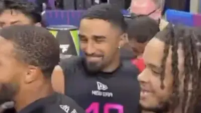 Jonas Sanker huddles with other players